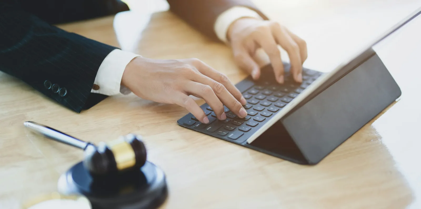 Lawyer reviewing credit agreements on a tablet